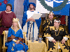 Corvite Master Eldred heralds Their Majesties' Court. Click here for full size image.