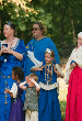 Baroness Adeliza and Lady Alessandra watch the bocce game. Click here for full size image.